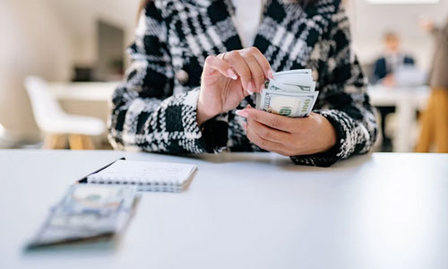 A-woman-counting-money