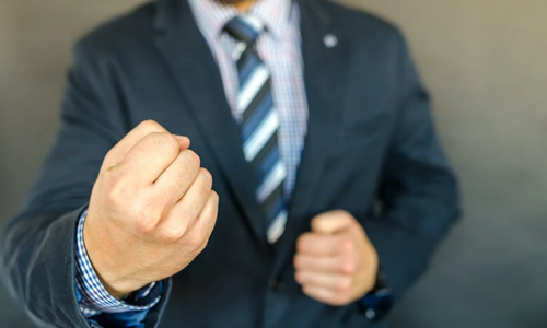 Man showing a “success” indication