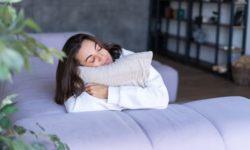 Picture of women sleeping on a couch